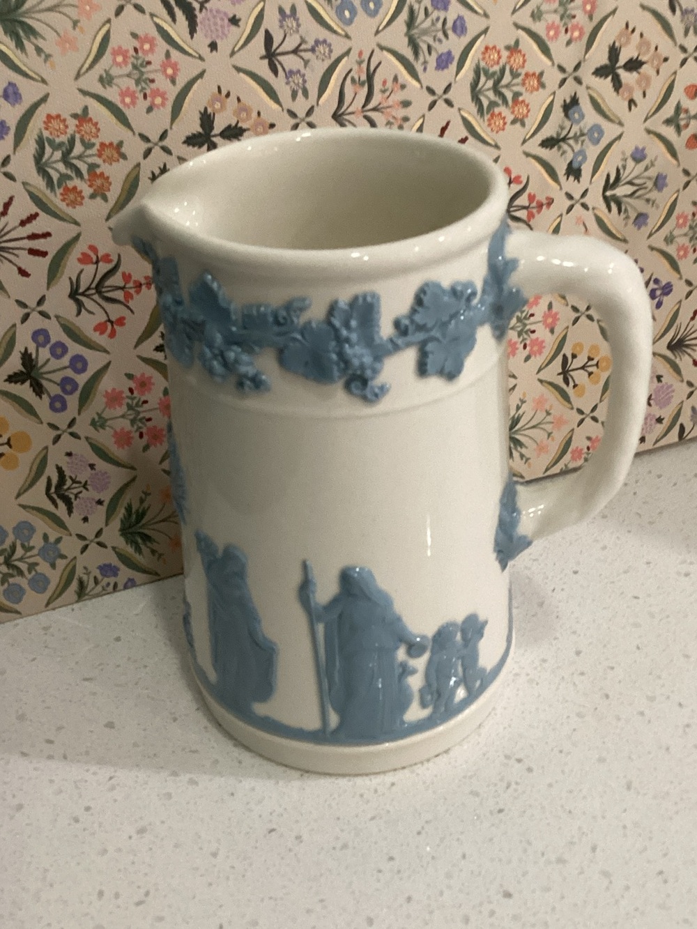 White Ceramic Pitcher with Pale Blue Relief Figures - Classic Home Art